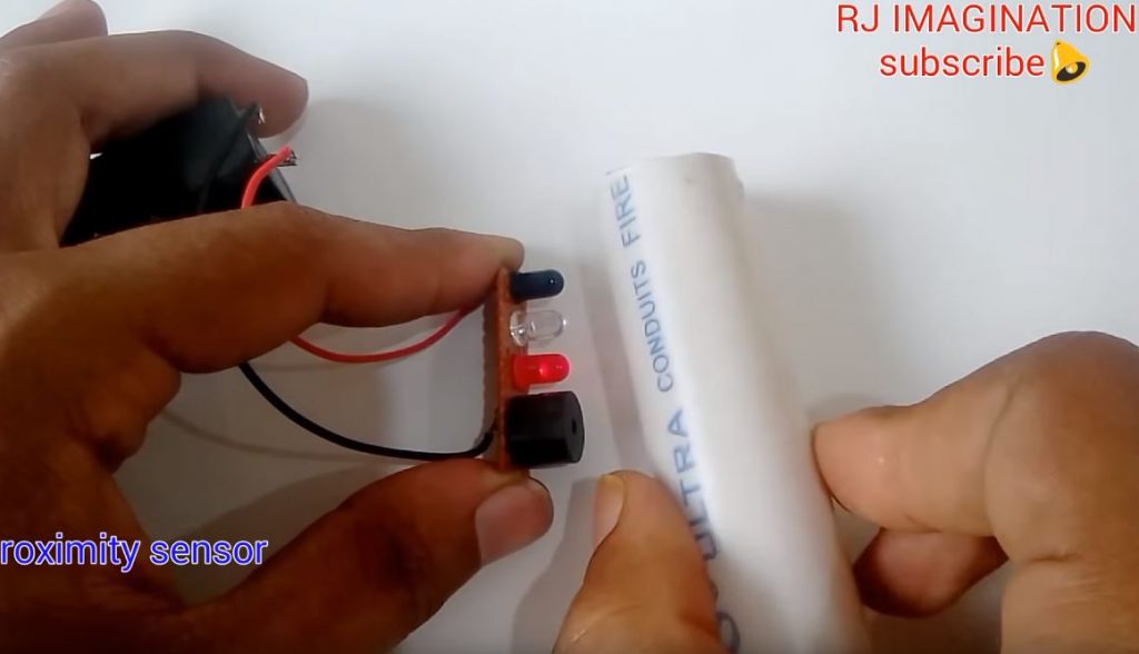 При приближении к датчику какого-либо предмета, загорается светодиод и срабатывает зуммер